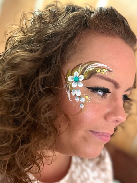 lady with a glitter face paint festival style in Shifnal